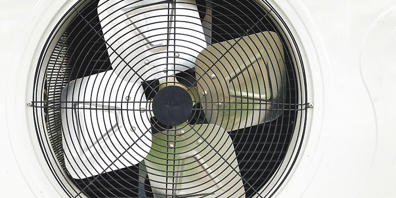 A close-up view of a white air conditioner showcasing in need of AC Repair in Knoxville, TN