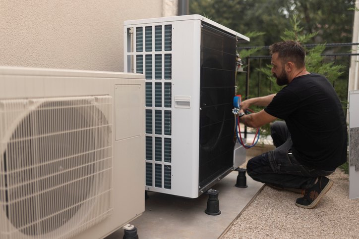 HVAC repair experts replacing heating system in Knoxville, TN